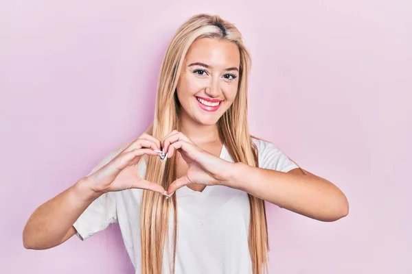 Young Blonde Girl Wearing Casual White Shirt Smiling Love Doing — Fotografia de Stock