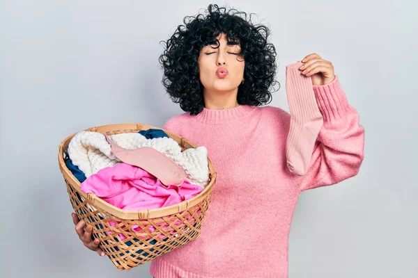 Young Middle East Woman Holding Laundry Basket Sock Looking Camera — Φωτογραφία Αρχείου