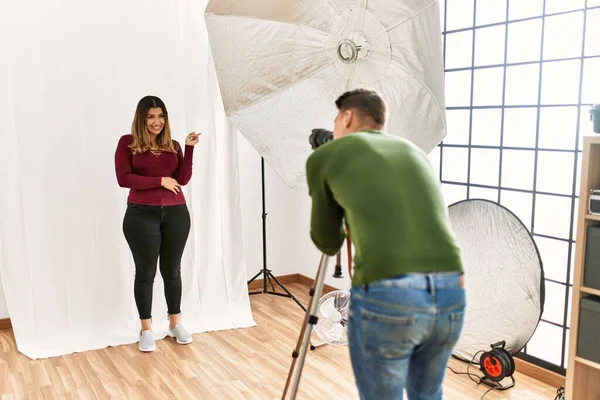 Young Woman Photography Studio Smiling Happy Pointing Hand Finger Side — Stock Photo, Image