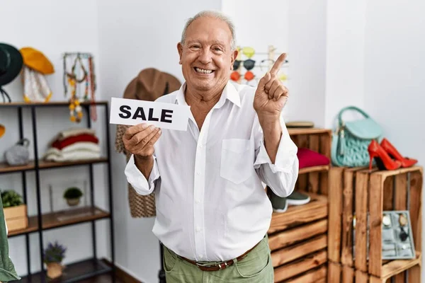 Senior Man Holding Sale Banner Retail Shop Smiling Happy Pointing — ストック写真