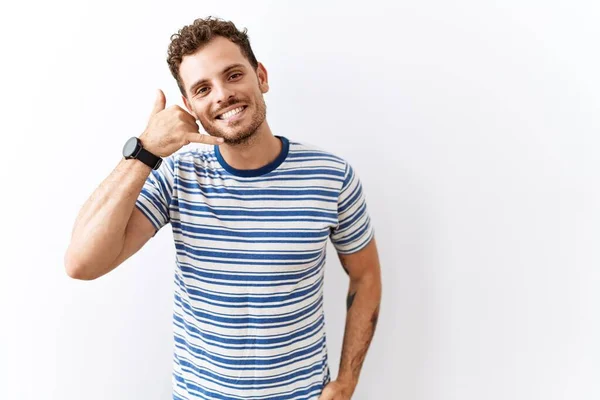 Handsome Young Man Standing Isolated Background Smiling Doing Phone Gesture — Stok Foto