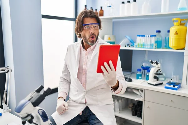 Handsome Middle Age Man Working Scientist Laboratory Doing Video Call — Stockfoto