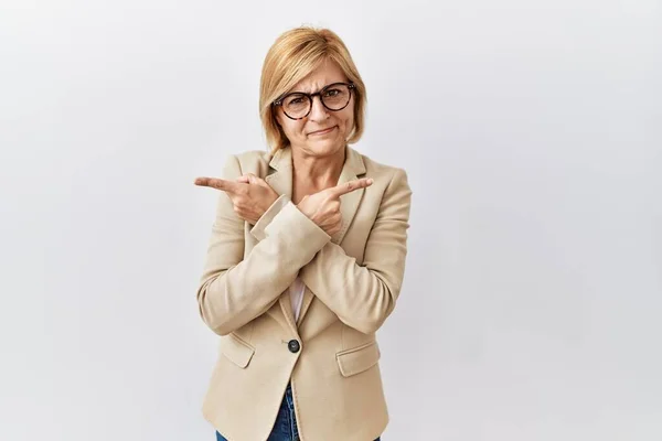 Middle Age Blonde Business Woman Standing Isolated Background Pointing Both — Fotografia de Stock