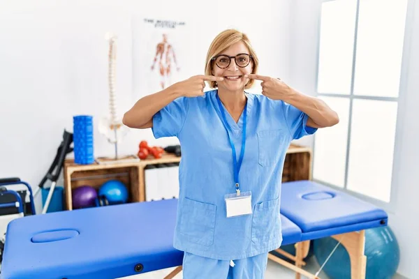 Middle Age Blonde Woman Working Pain Recovery Clinic Smiling Cheerful — Foto de Stock