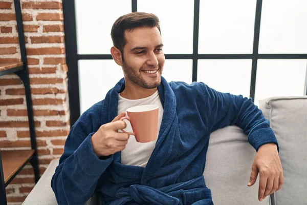 Young Hispanic Man Wearing Robe Drinking Coffee Home — Foto de Stock