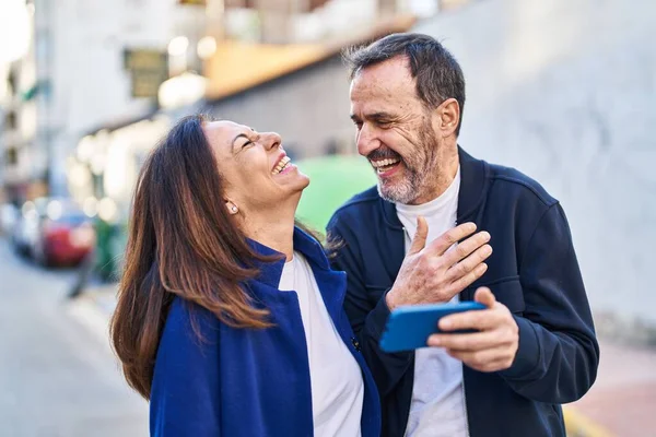 Middle Age Man Woman Couple Using Smartphone Standing Together Street — Stockfoto
