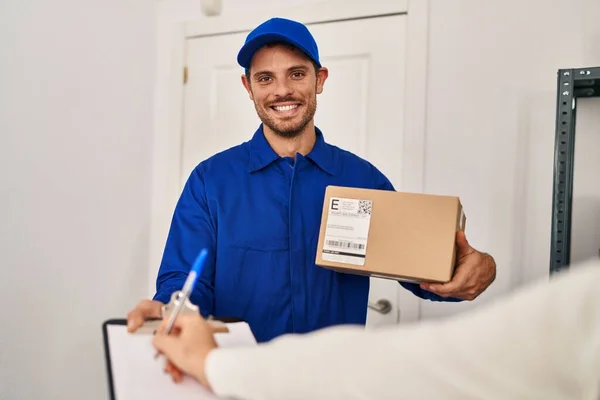 Young Hispanic Man Courier Holding Package Home — Stok fotoğraf