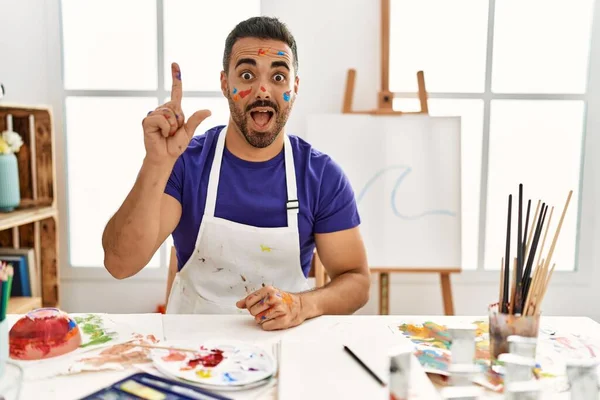 Young Hispanic Man Beard Art Studio Painted Face Pointing Finger — 图库照片