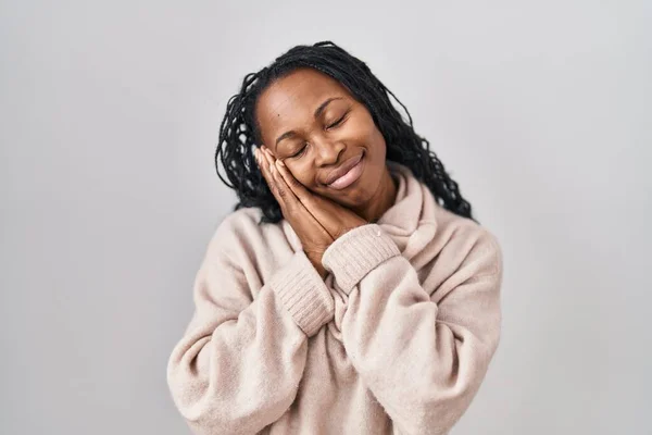 African Woman Standing White Background Sleeping Tired Dreaming Posing Hands — Fotografia de Stock