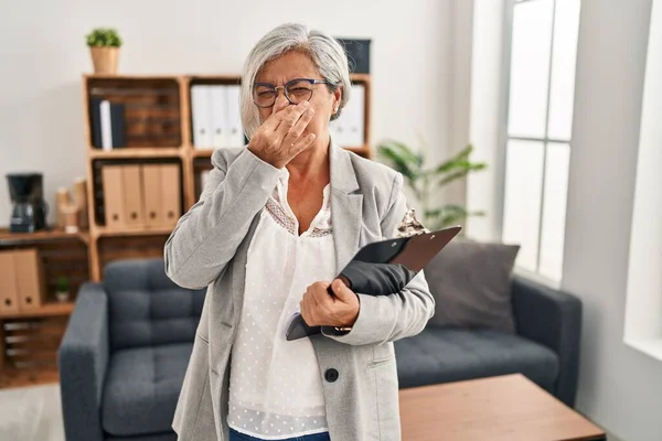 Middle Age Woman Grey Hair Consultation Office Smelling Something Stinky — Stockfoto