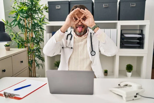 Handsome Middle Age Doctor Man Working Clinic Doing Gesture Binoculars — Foto Stock