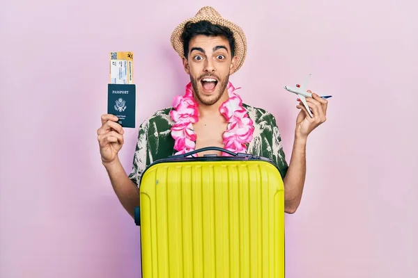 Young Hispanic Man Wearing Summer Style Hawaiian Lei Holding Passport — Stock Photo, Image