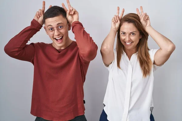 Mother Son Standing Together Isolated Background Posing Funny Crazy Fingers — Stockfoto