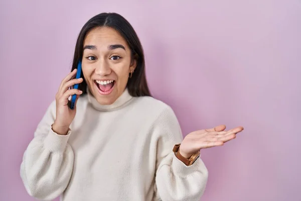 Young South Asian Woman Having Conversation Talking Smartphone Celebrating Achievement — Stock fotografie