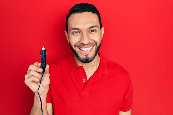 Hispanic Man Beard Holding Car Charger Looking Positive Happy Standing — Photo