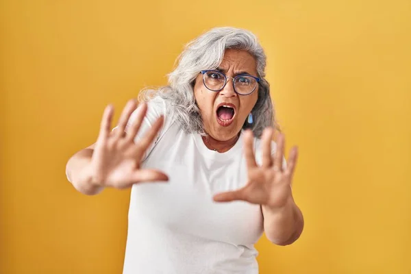 Middle Age Woman Grey Hair Standing Yellow Background Afraid Terrified —  Fotos de Stock