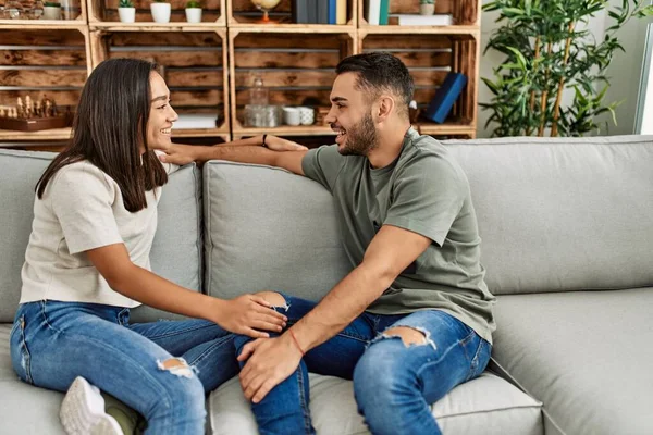 Young Latin Couple Having Conversation Sitting Sofa Home — Stock Photo, Image