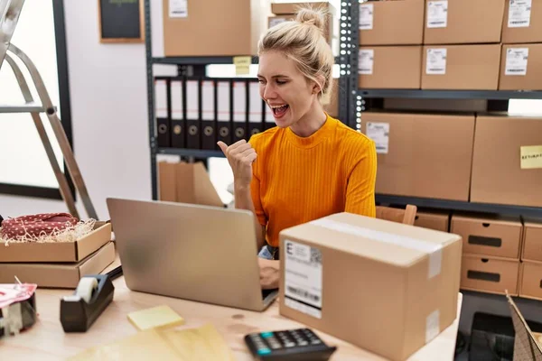 Young Blonde Woman Working Small Business Ecommerce Using Laptop Pointing — Stockfoto
