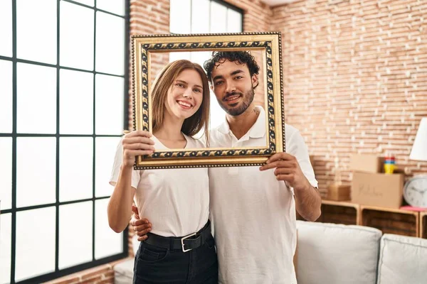 Young Two People Holding Empty Frame Together Smiling Happy Cool — Stockfoto