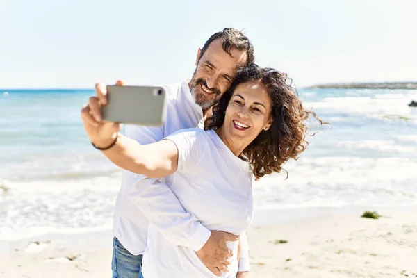 Middle Age Hispanic Couple Smiling Happy Hugging Making Selfie Smartphone — Stock Photo, Image