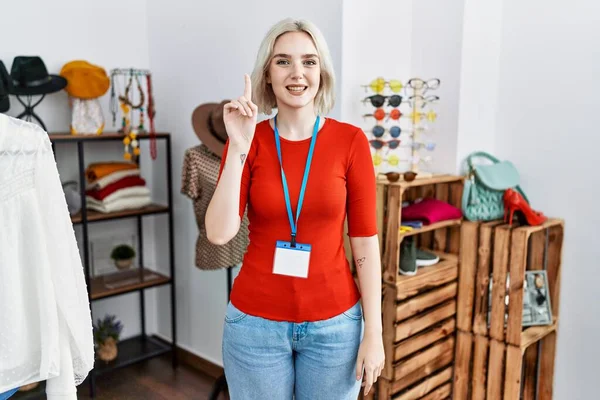 Young Caucasian Woman Working Manager Retail Boutique Showing Pointing Finger — Stock fotografie