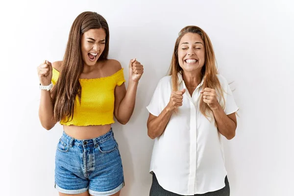 Mother Daughter Together Standing Together Isolated Background Excited Success Arms — Foto Stock