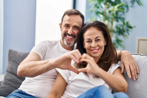 Middle Age Man Woman Couple Doing Heart Gesture Hands Sitting — Stock Photo, Image
