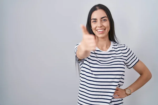 Young Brunette Woman Wearing Striped Shirt Smiling Friendly Offering Handshake — Φωτογραφία Αρχείου