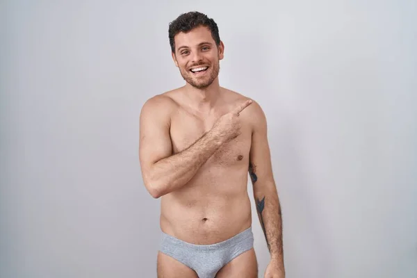 Young Hispanic Man Standing Shirtless Wearing Underware Cheerful Smile Face — Zdjęcie stockowe