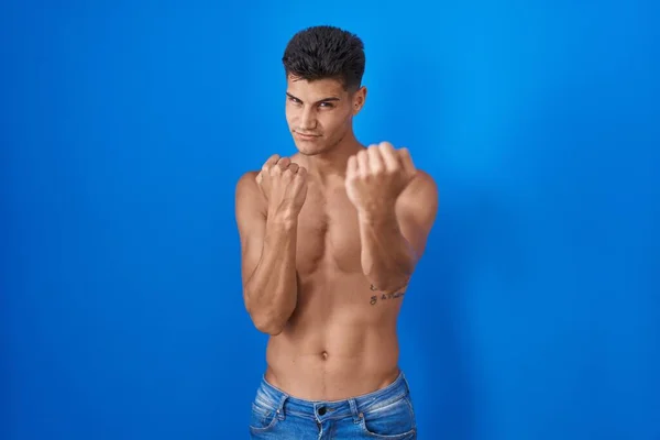 Young Hispanic Man Standing Shirtless Blue Background Ready Fight Fist — Fotografia de Stock