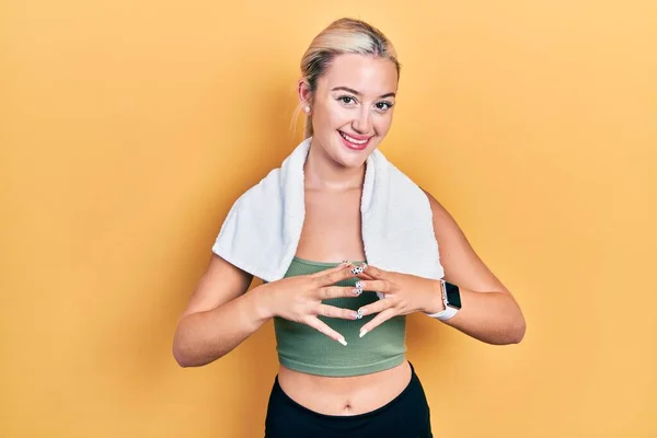 Young Blonde Girl Wearing Sportswear Towel Hands Together Fingers Crossed — Stockfoto