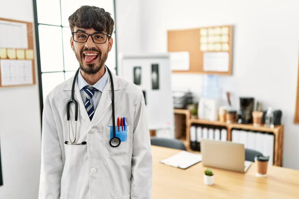 Hispanic Man Beard Wearing Doctor Uniform Stethoscope Office Sticking Tongue — 스톡 사진