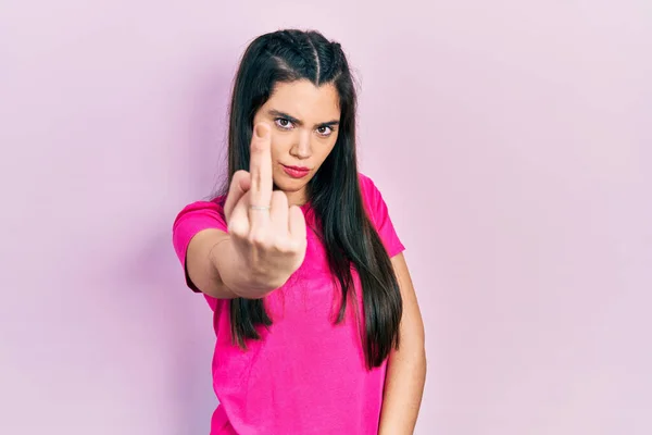 Young Hispanic Girl Wearing Casual Pink Shirt Showing Middle Finger — Photo