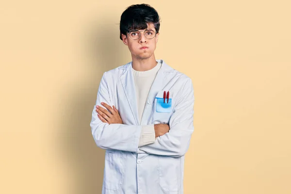 Handsome Hipster Young Man Crossed Arms Wearing Doctor Uniform Puffing — Φωτογραφία Αρχείου