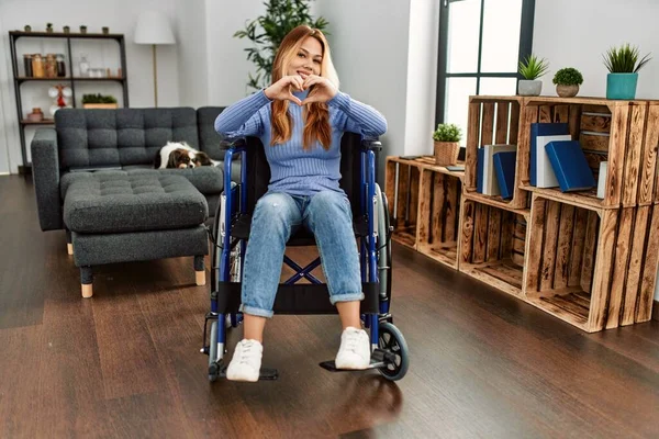 Young Beautiful Woman Sitting Wheelchair Home Smiling Love Doing Heart — Stock fotografie