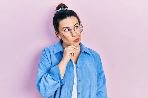 Young Hispanic Woman Wearing Casual Clothes Glasses Serious Face Thinking — Zdjęcie stockowe