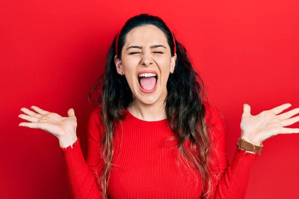 Young Hispanic Woman Wearing Casual Clothes Celebrating Mad Crazy Success — Stock Photo, Image