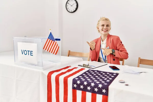 Beautiful Caucasian Woman Working Political Campaign Pointing Back Hand Thumbs — Stockfoto