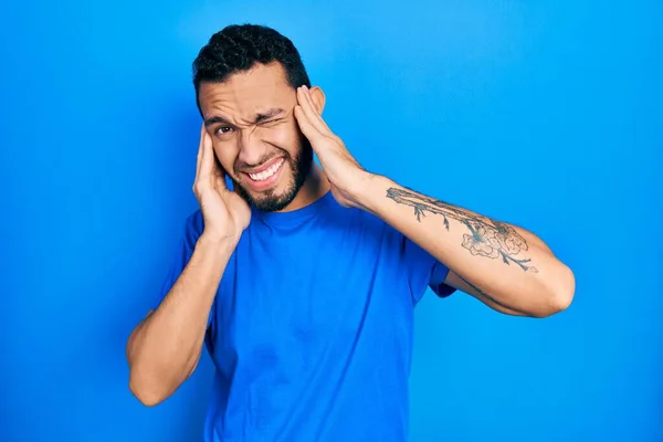 Hispanic Man Beard Wearing Casual Blue Shirt Covering Ears Fingers — Stok fotoğraf