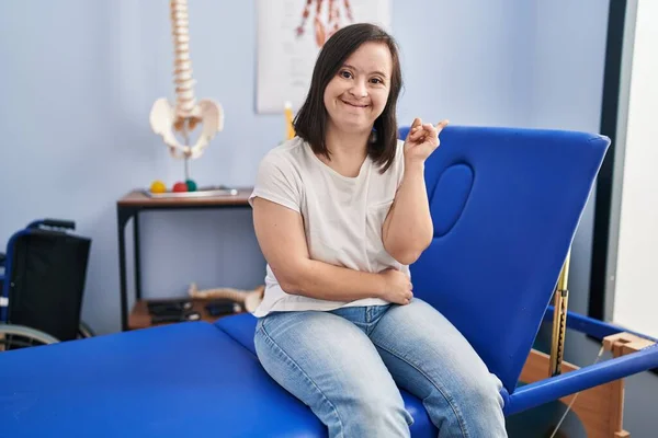 Hispanic Girl Syndrome Physiotherapy Clinic Smiling Happy Pointing Hand Finger — Stockfoto