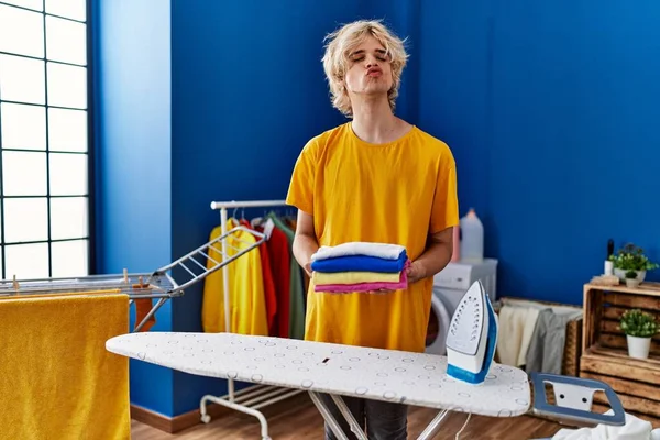 Young Man Ironing Clothes Home Looking Camera Blowing Kiss Being — 스톡 사진