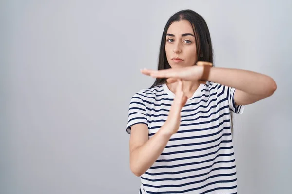 Young Brunette Woman Wearing Striped Shirt Doing Time Out Gesture — Foto Stock