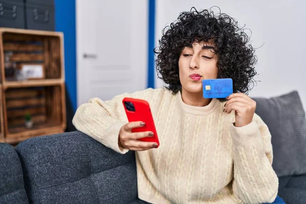 Young Middle East Woman Using Smartphone Credit Card Sitting Sofa — Foto de Stock