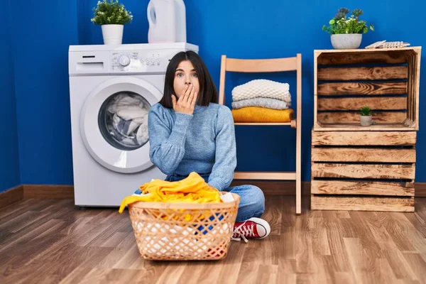 Young Hispanic Woman Laundry Room Covering Mouth Hand Shocked Afraid — Stockfoto