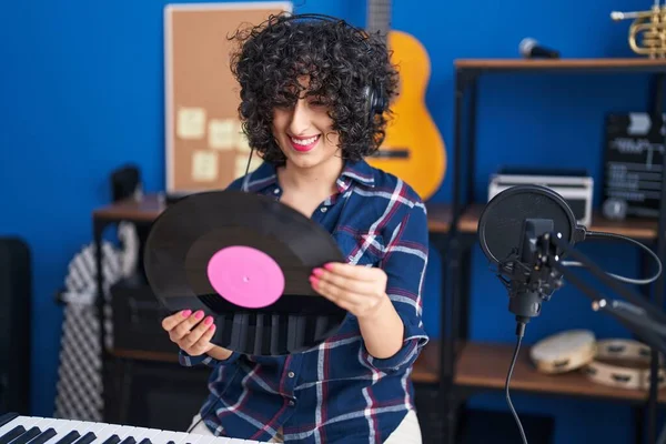 Young Middle East Woman Musician Listening Music Holding Vinyl Disc — 图库照片