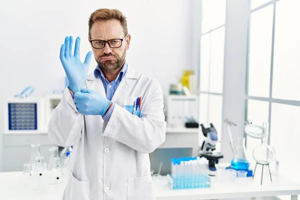 Middle Age Man Working Scientist Laboratory Depressed Worry Distress Crying — Stockfoto