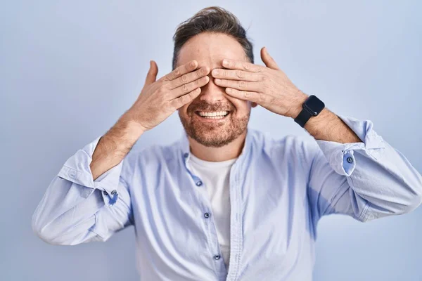 Middle Age Caucasian Man Standing Blue Background Covering Eyes Hands —  Fotos de Stock