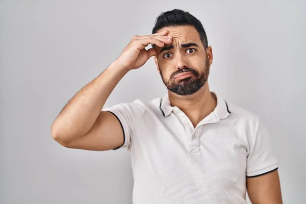 Young Hispanic Man Beard Wearing Casual Clothes White Background Worried — Stockfoto