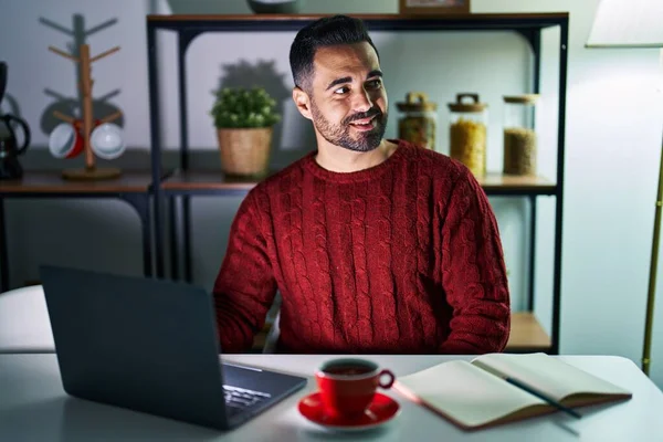 Young Hispanic Man Beard Using Computer Laptop Night Home Looking — Stockfoto
