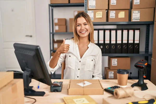 Young Blonde Woman Working Small Business Ecommerce Doing Happy Thumbs — Stock fotografie